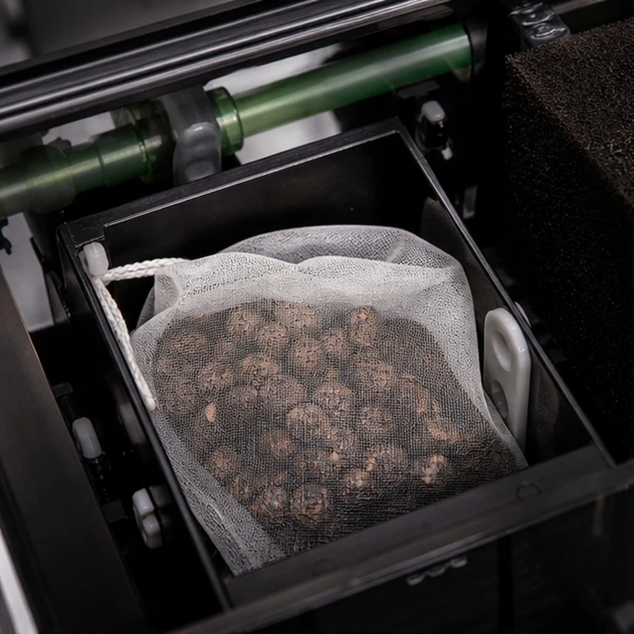 Premium Blackwater Peat Balls illustrative product-world scene: Contained filter-media route