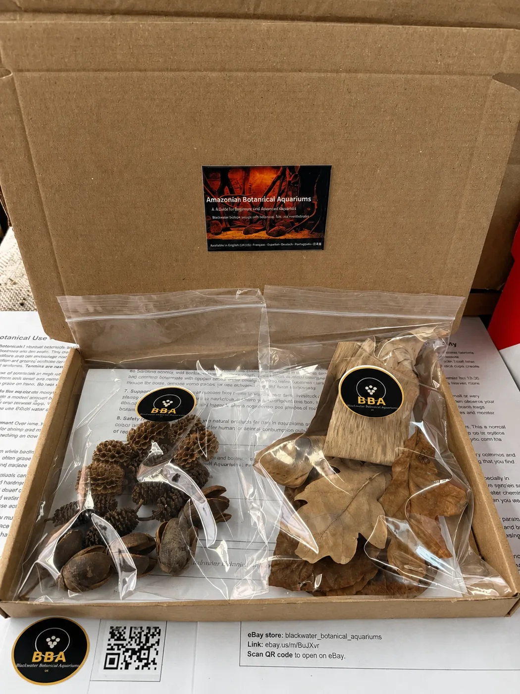 Prepared Blackwater Botanical Aquariums box with labelled botanicals and QR guidance card.